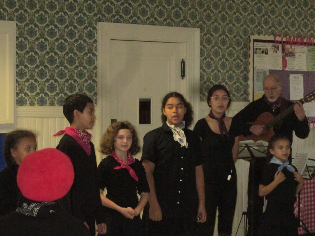 children singing at performance